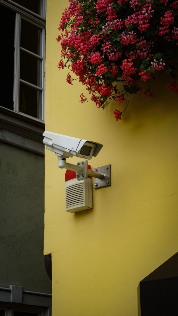 a camera mounted at a building’s entrance