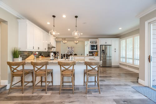 A kitchen decorated in neutral colors.