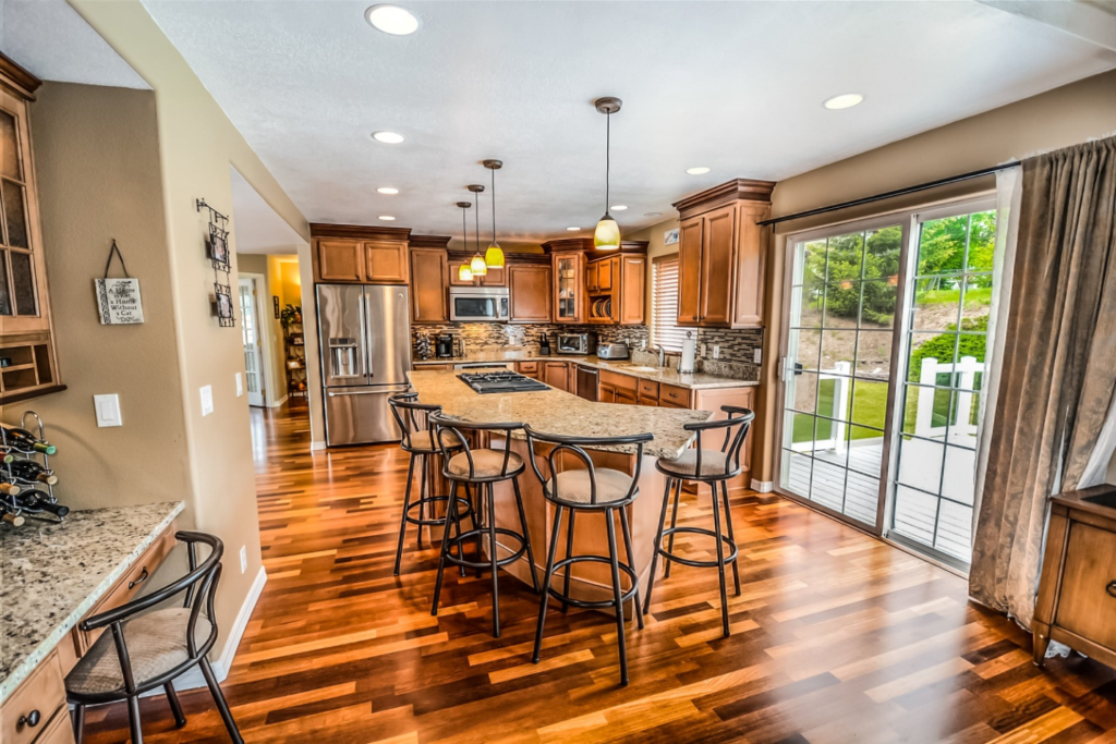 A huge kitchen with a wooden floor