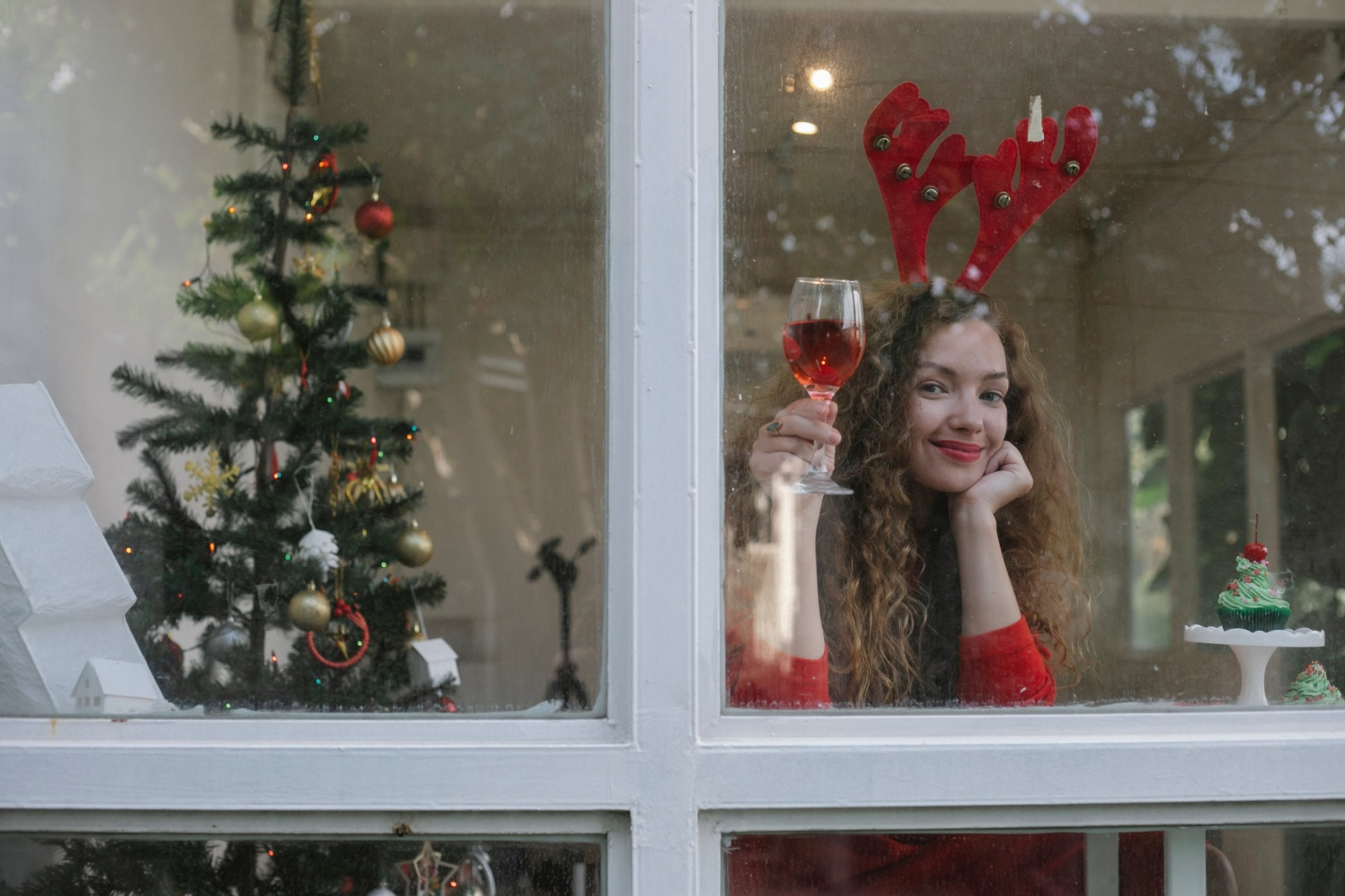 A woman drinking red wine