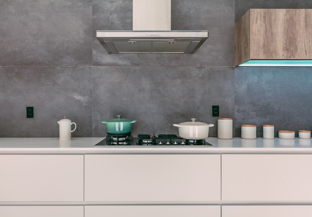 A grey tiled kitchen